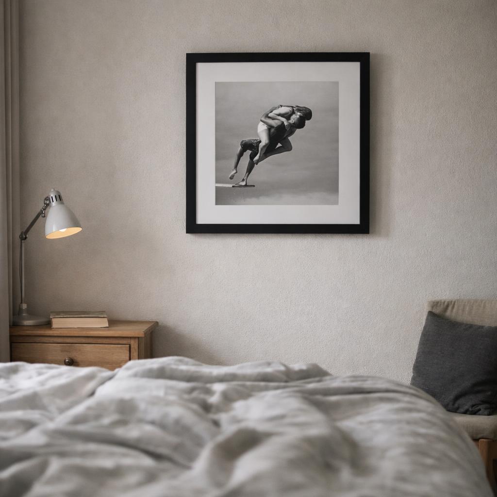 Passionate Diving Embrace by Tatyana Druz. Classic Oak framed print hanging above a chest of drawers in a bedroom, from TheArtFolio